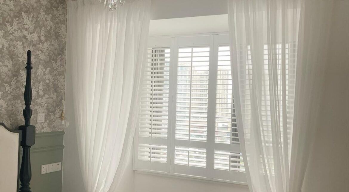 curtains paired with california shutters